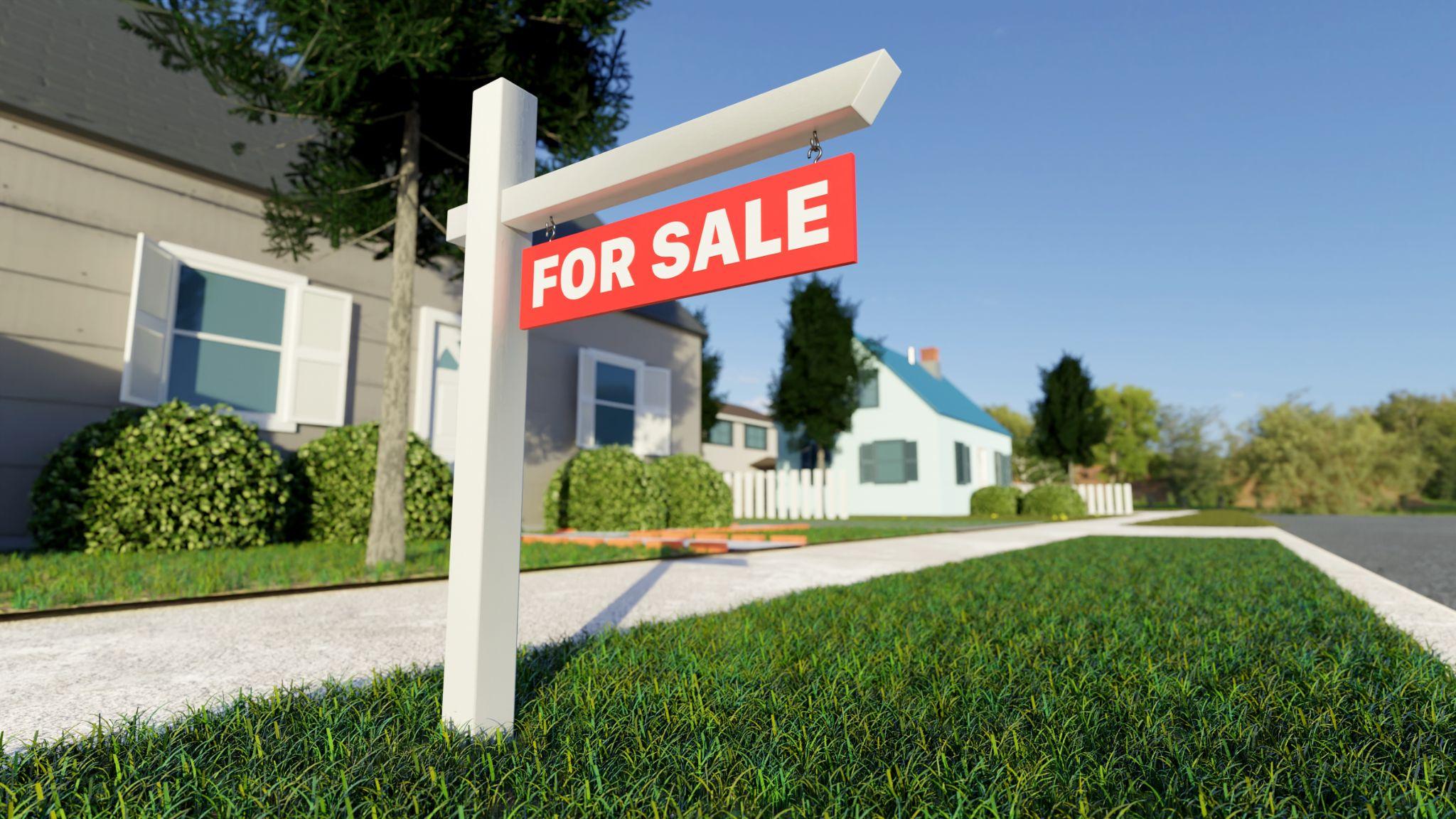 Estate agent and customer shaking hands after finished contract