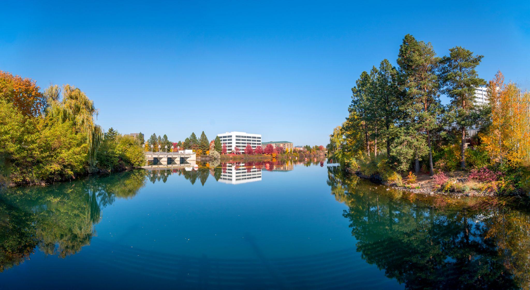 Panoramic view of the Upper Falls Reservoir and Dam at Riverfront Park in downtown Spokane