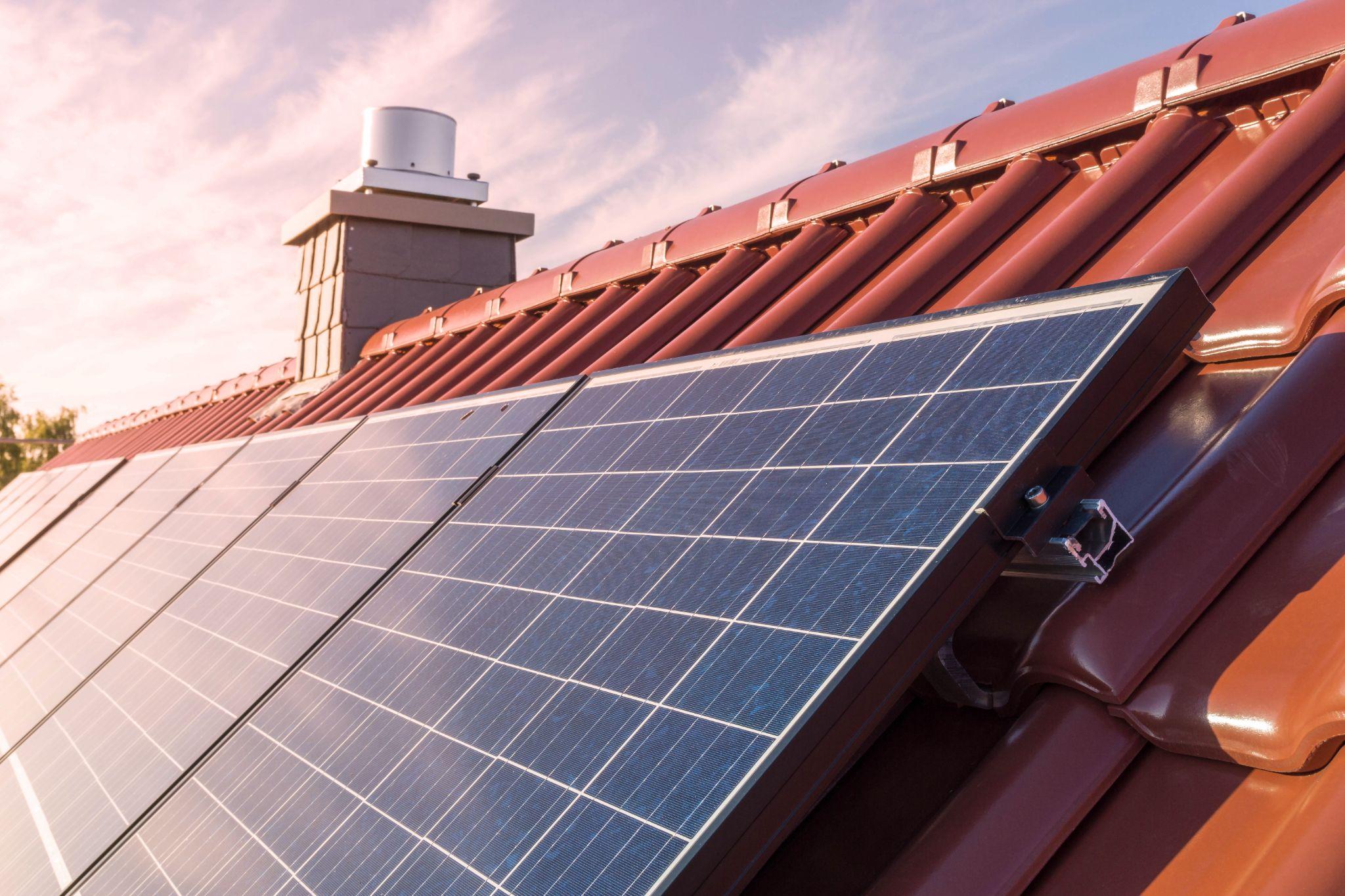 solar panels or photovoltaic plant on the roof of a house